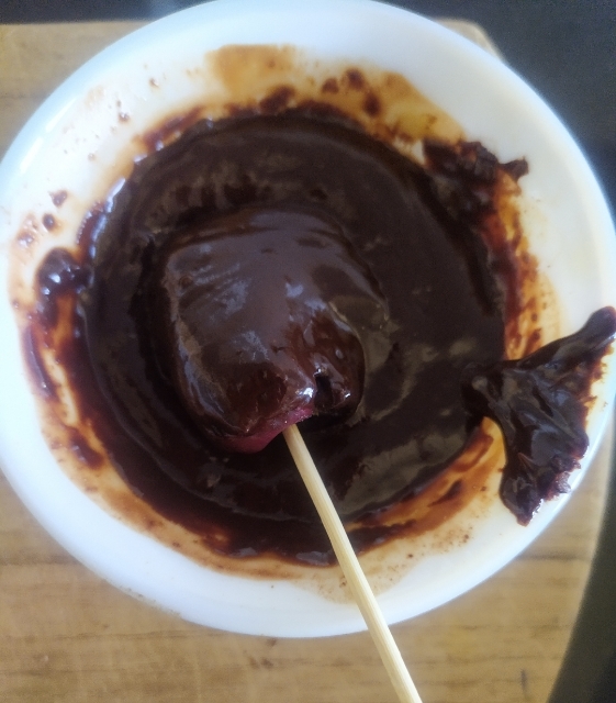 Dip the dates  in the meltedchocolate