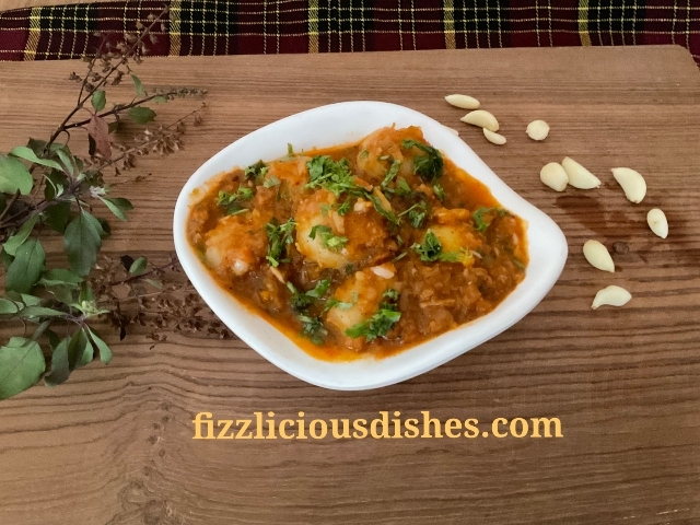 Spicy Garlic Potatoes In gravy / Lasooni Aloo